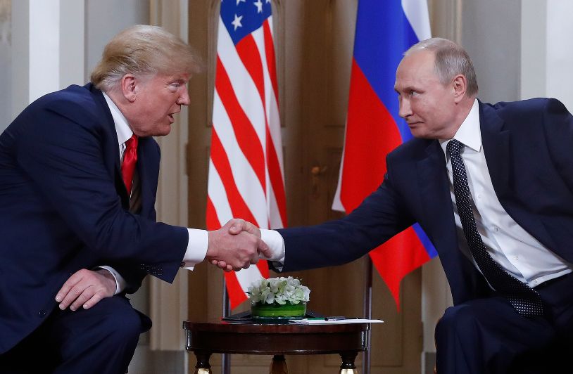 Trump’s Dangerous Diesel Deal Trump and Putin handshake